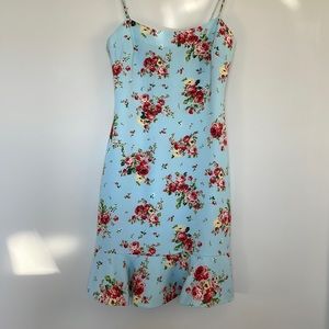 Likely dress size 2 with beautiful floral pattern in perfect condition